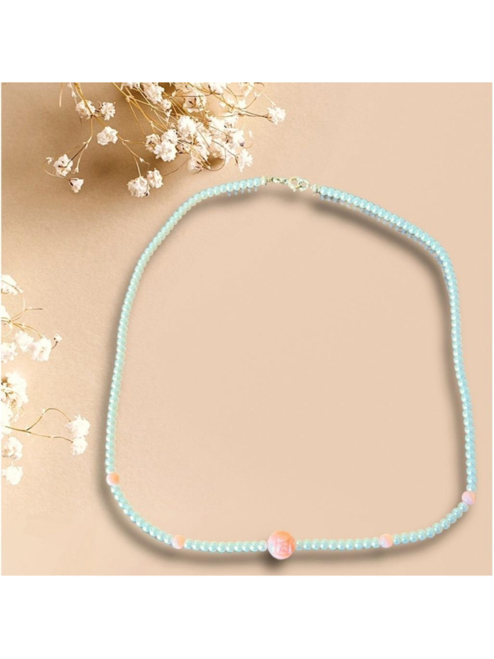 BOHO Faux Pearl necklace with peach accents 17 1/4” long. Central floral bead
